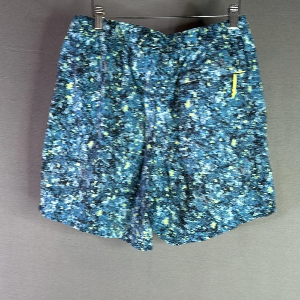 The North Face Blue and Yellow Athletic Shorts size medium‎